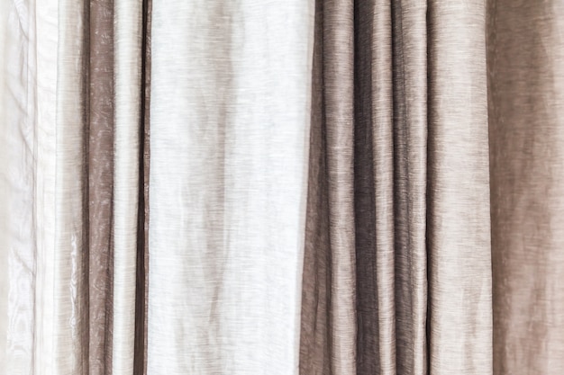 gray curtains at the windows for background