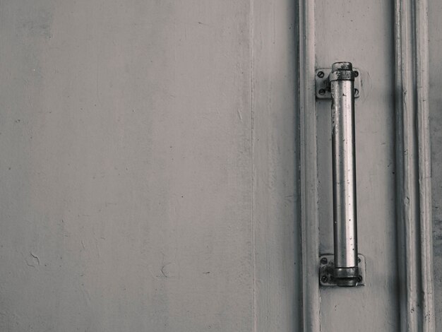 Gray door and metal door handle