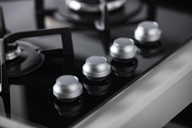 gray hob control knobs shallow depth of field