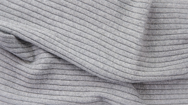 Gray knitted . Knitted fabric, wool texture