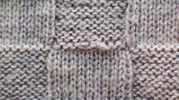 Gray of knitted yarn, texture pattern knitted fabric close-up