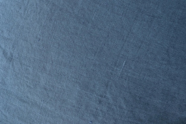 Photo gray linen or cotton fabric backgroundtexture of woven grey blue cloth natural eco friendly textile