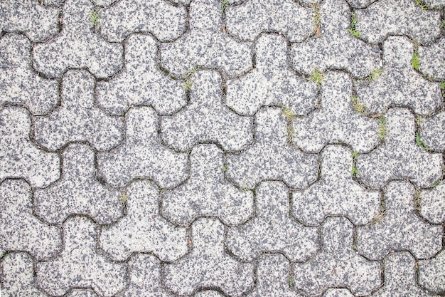 Foto lastre di pavimentazione grigie sulla strada