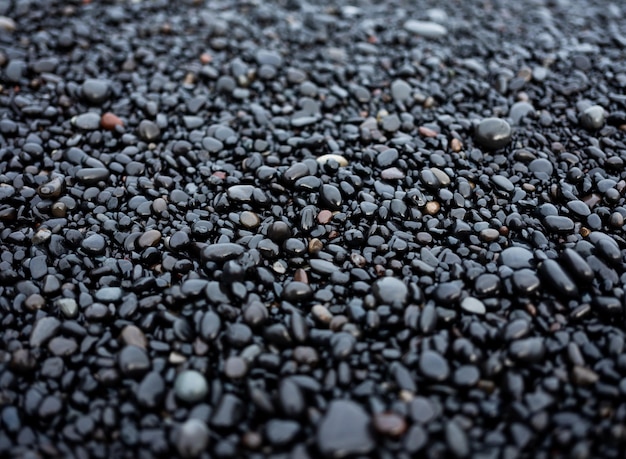 Gray pebbles as a background in the Iceland sea shore Abstract composition Design image