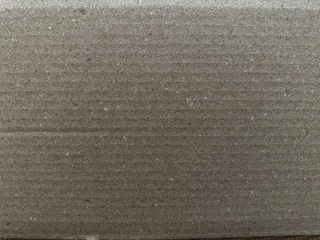 a gray piece of material with white dots on it