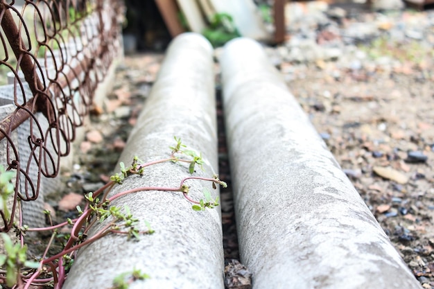 Gray pipes at a construction site.