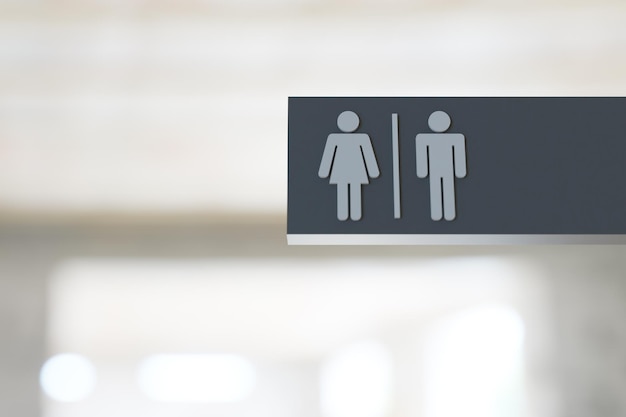 Gray restroom sign in hallway 3d rendering