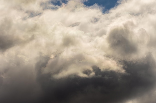 Gray sky background with stormy dark clouds