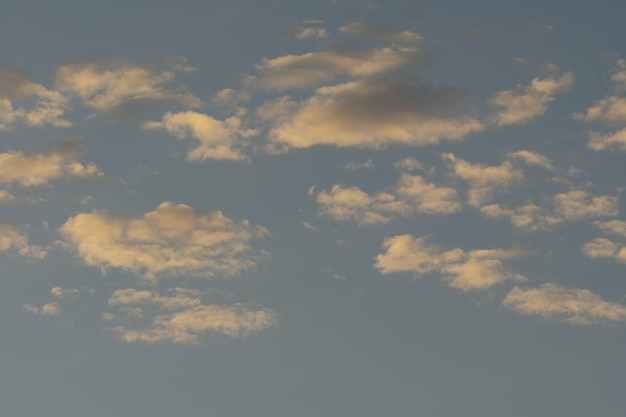 Gray sky background with white clouds