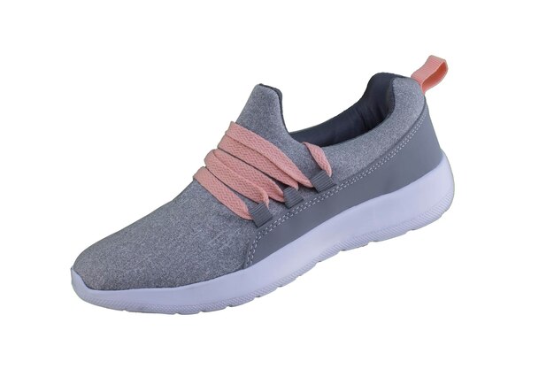 Gray sneaker with orange laces Sport shoes on white background