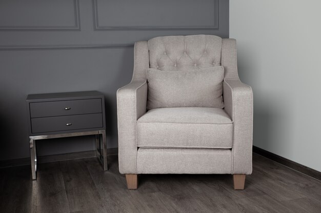 Photo gray sofa and black table in the living room