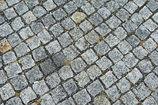 Gray square stones paved road