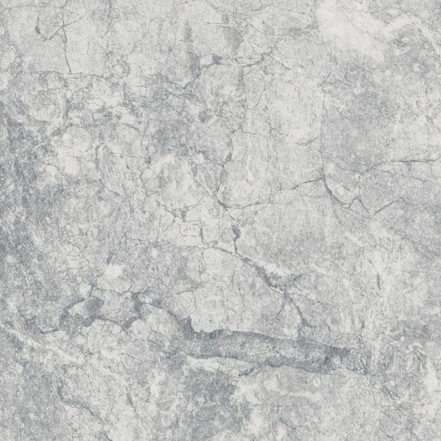 Photo a gray stone wall with a crack in it and a small arrow pointing to the right