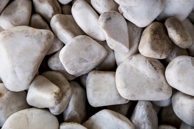 Gray stones of different shapes in the garden.