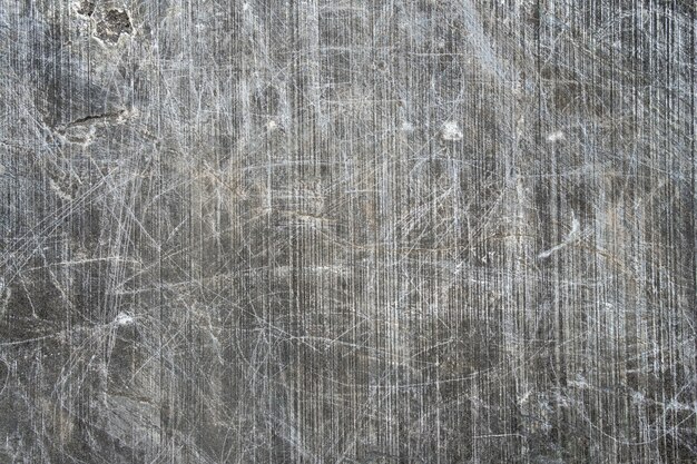 Gray surface of marble stone with striped streaks.