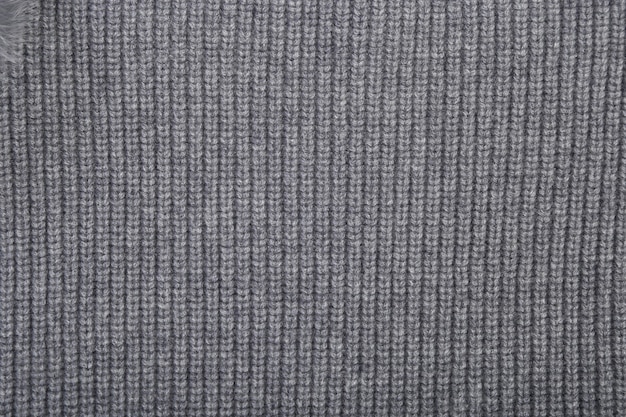 Photo gray texture wool close-up, woven cloth, knitted fabric