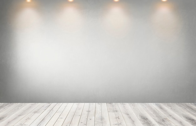 Gray wall with a row of spotlights in an empty room