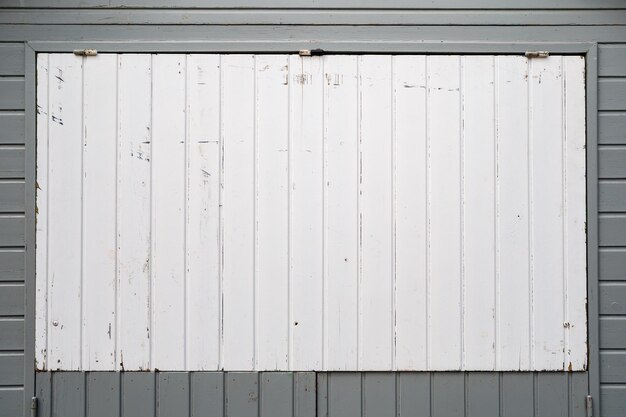 Photo in gray and white colored wooden house