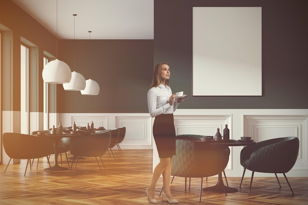 Gray and white restaurant inerior with a wooden floor and dark gray chairs near round tables. A woman. 3d rendering mock up toned image