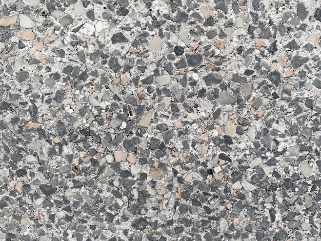 Photo a gray and white speckled granite surface.