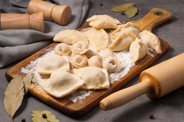 Great assorted dumplings on a wooden board