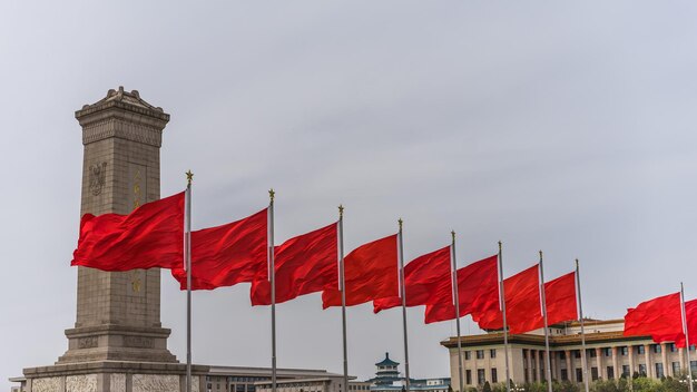 Photo great hall of the people in china under a cloudy sky