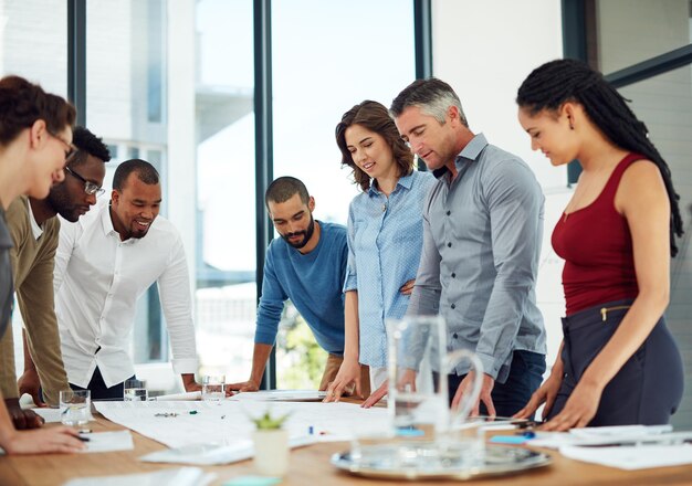 Great ideas in the making Cropped shot of a group of architects in the boardroom