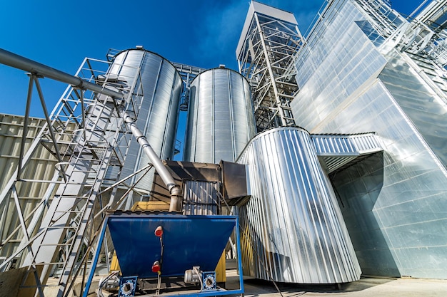 Great industrial tank of fuel. Big warehouse tubes. Steel barrels in factory.