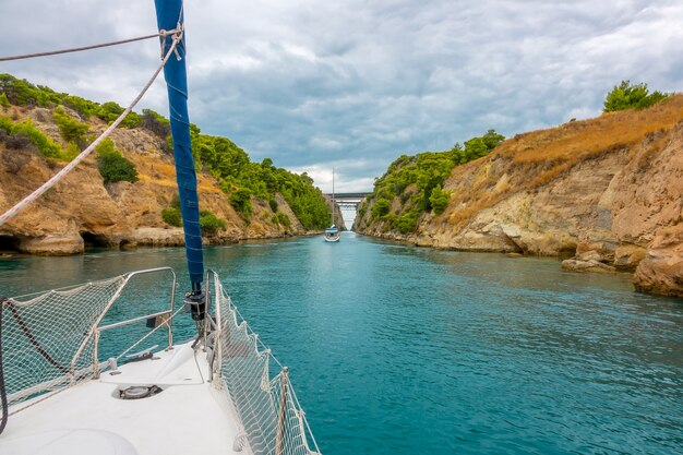 Greece. Sailing yachts go along the old Corinth Canal