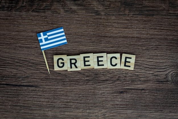 Greece - wooden word with greek flag (wooden letters, wooden sign)