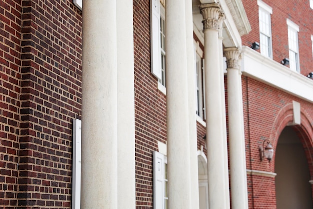 Greek columns bathed in golden sunlight evoke timeless grandeur and architectural mastery