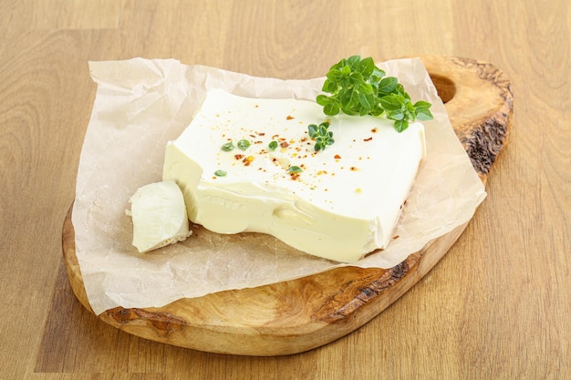 Greek Feta cheese over board