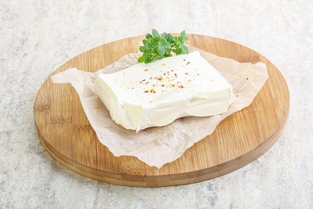 Greek Feta cheese over board