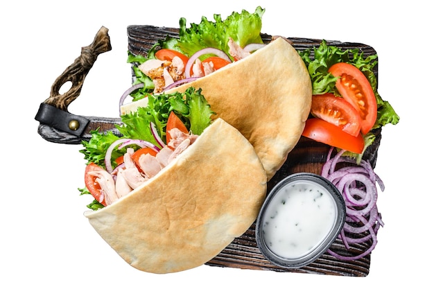 Foto giroscopi greci avvolti in pane pita con verdure e salsa isolati su sfondo bianco vista dall'alto