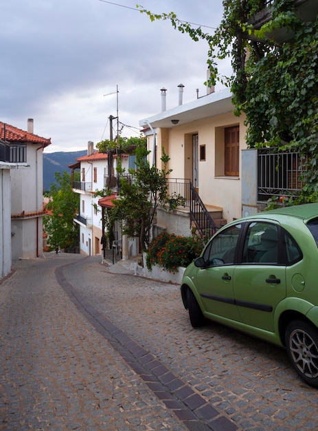 Greek houses and narrow cobblestone streets in the mountain resort village of Arachova in Greece