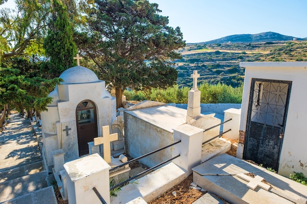 Greek orthodox graveyard. Ancient grave on the cemetery in Lefkes, Paros, Greece