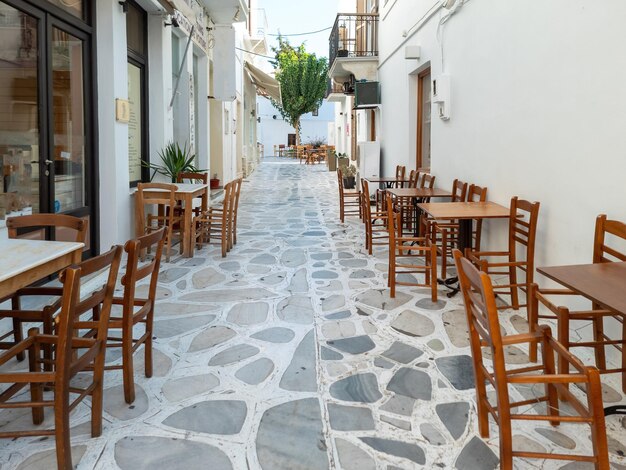 Greek outdoors traditional tavern restaurant at Tinos island Chora town Cyclades Greece