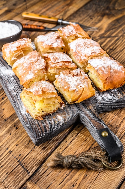 Greek pastry Bougatsa with phyllo dough and semolina custard cream.