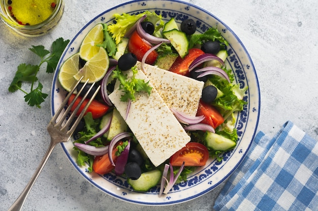 Greek salad in ceramic plate