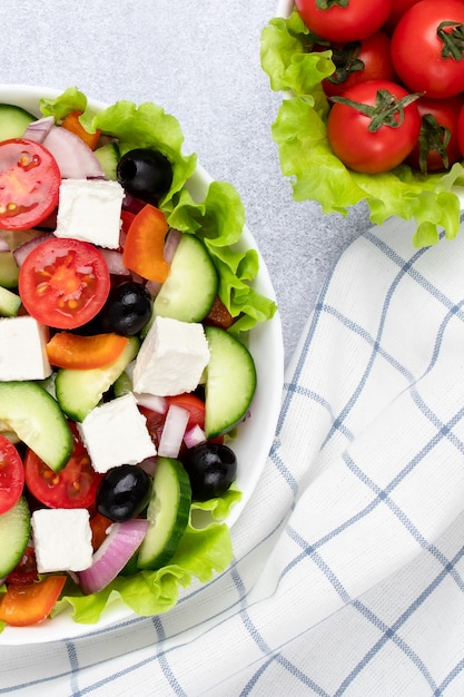 greek salad  made with pieces of vegetables and cheese