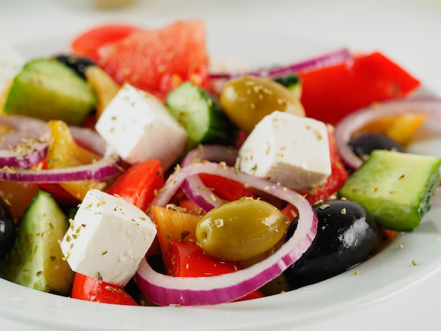 Greek salad on the table close up