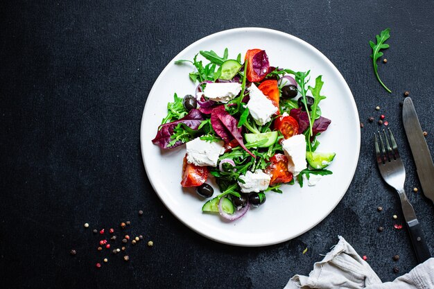 Greek salad vegetables and feta cheese portion