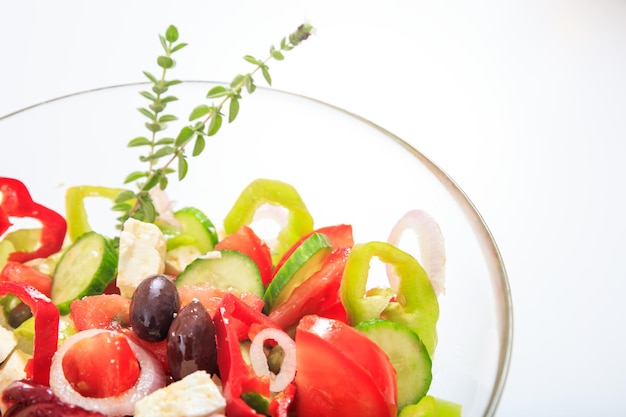 Greek salad on white background