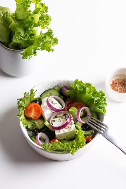 Greek salad with feta cheese and red onion