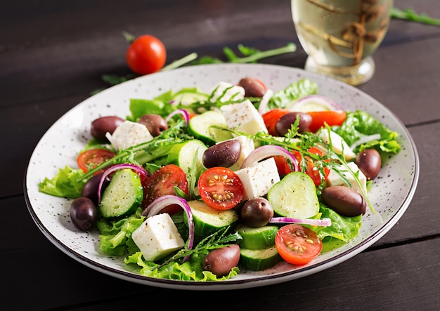 Greek salad with fresh vegetables, feta cheese and kalamata olives