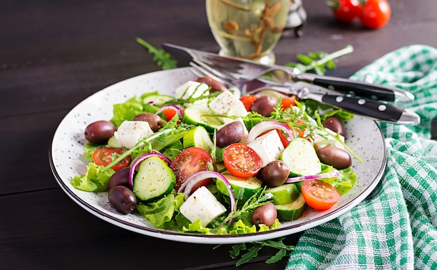 Greek salad with fresh vegetables, feta cheese and kalamata olives