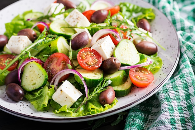 Greek salad with fresh vegetables, feta cheese and kalamata olives