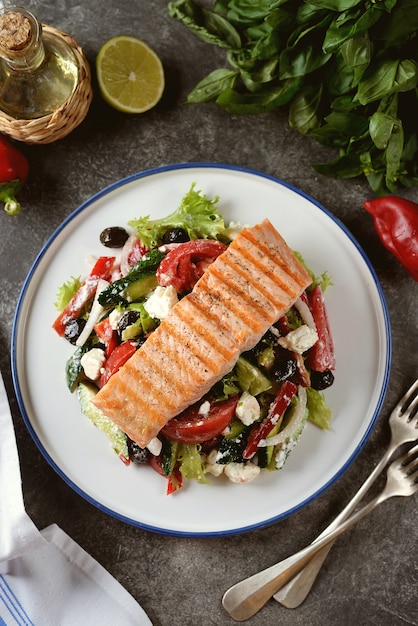 Greek salad with grilled salmon