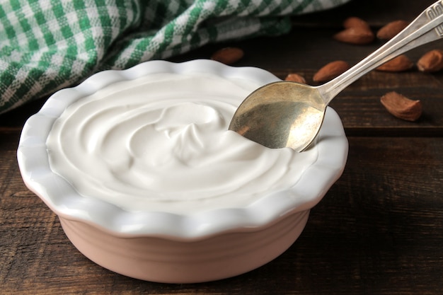 Greek yogurt in a ceramic bowl on the table