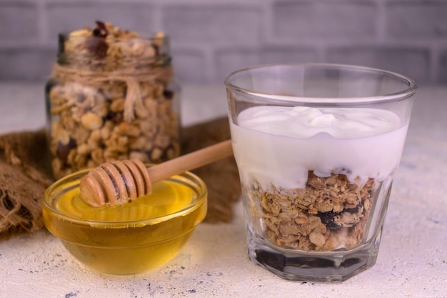 Greek yogurt dessert with granola and honey